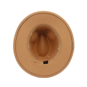 Detailed interior of camel felt fedora showing the inner sweatband and care label