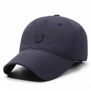 Navy blue winter baseball cap for men with warm lining and waterproof fabric for outdoor