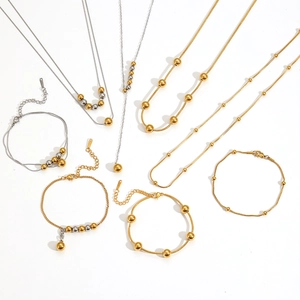 Parure de bijoux minimaliste en acier inoxydable avec collier et bracelet à billes dorées