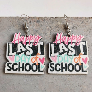 Detail of wooden earrings with Happy Last Day of School text and silver hooks