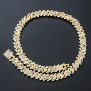 Detail of 14mm gold-plated Cuban link chain with paved cubic zirconia stones and square clasp