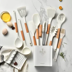 12-piece cream silicone cooking utensils with wooden handles and storage bucket