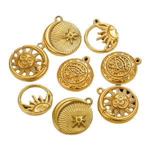 Set of 18K gold-plated stainless steel charms with sun, moon, and eye designs