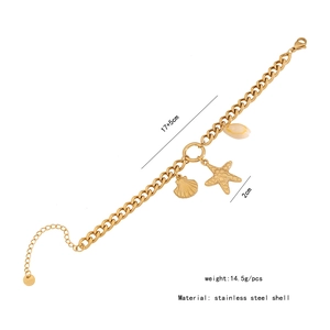Detail of gold stainless steel shell necklace with 17+5cm length and starfish pendant