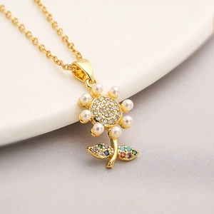 18K gold plated necklace featuring a sunflower pendant with pearls and zircon details