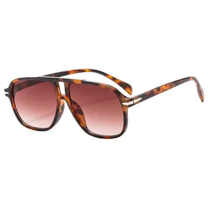 Classic tortoise pilot sunglasses with brown gradient lenses and silver metal accents