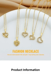Detail of five assorted 18K gold-plated heart necklaces with sparkling cubic zirconia