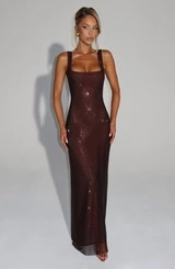 Detail of dark red sequin party dress showing square neckline and slim fit silhouette