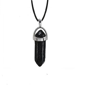 Macro shot of black hexagonal quartz point pendant with silver clasp on simple cord