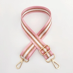 Adjustable striped nylon bag strap with pink, white and gold glitter metallic threads
