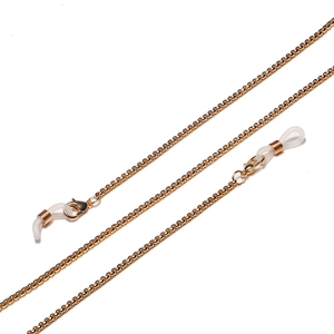 Detail of golden metal glasses chain with lobster clasps and white silicone loops