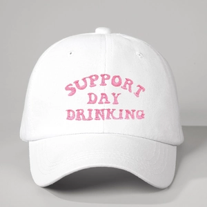 Detail view of white cotton baseball cap with Support Day Drinking pink embroidery