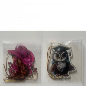 Detailed view of 8cm acrylic flower basket and owl hanging decor with golden string