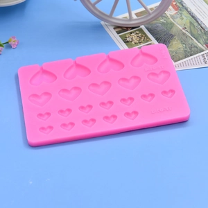 Pink silicone heart mold with 20 varied cavities for DIY chocolate and cake decoration