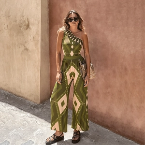 Detail of bohemian geometric print one-shoulder jumpsuit with wide-leg design