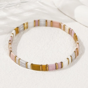 Rainbow Tila bead bracelet with colorful tiles and gold spacers in bohemian style