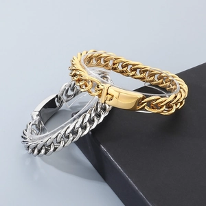 Close-up of 12mm Cuban chain bracelet showing polished gold and silver finishes