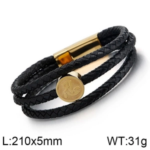 Detail of multi-layer braided leather bracelet with golden charm and magnetic clasp