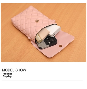 Pink quilted PU leather mobile phone bag interior view with gold magnetic buckle closure