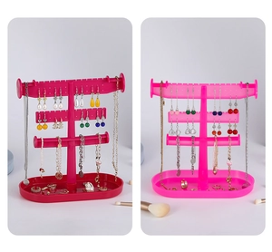 Detailed view of pink multi-layer jewelry organizer stand for earrings and necklaces