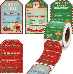 Detail of roll-packed paper Christmas gift tags showing various festive labels and designs