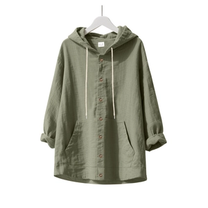 Detail of army green linen hooded shirt with drawstring and dark brown buttons