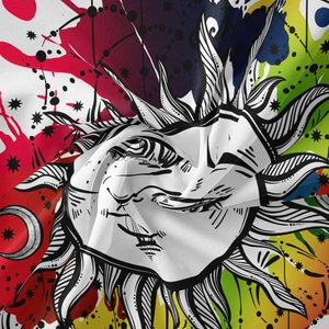 Close-up of bohemian mandala tapestry featuring sun and moon art with vibrant ink splashes