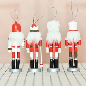 Set of 4 wooden Nutcracker ornaments with white faux hair and silver cords back view