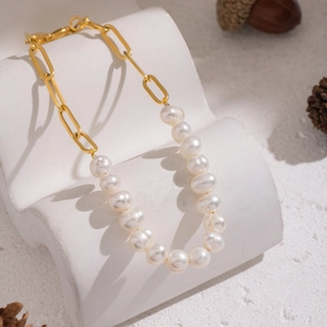 Elegant freshwater pearl and gold paperclip link chain bracelet with spring clasp