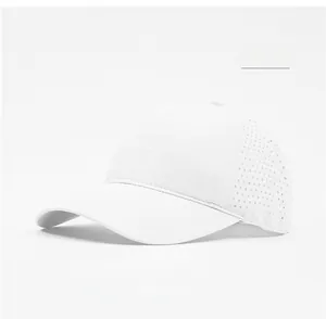 Detail of white breathable mesh baseball cap featuring laser-cut side ventilation holes