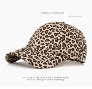 Detail of light khaki corduroy baseball cap with leopard print texture and six-panel crown