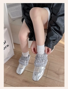 Detail of silver sneakers with grey plaid ruffle leg warmers for Lolita style fashion