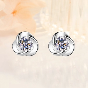 Elegant S999 silver flower stud earrings with sparkling clear cubic zirconia stones