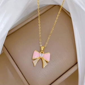 Pink bow pendant necklace with heart crystal and diamonds on titanium steel gold chain
