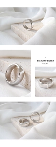 Macro shot of S925 sterling silver stamp and polished inner band of the ring