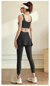 Detail of high-stretch sports set showing back cutout design and pleated tennis skirt-leggings