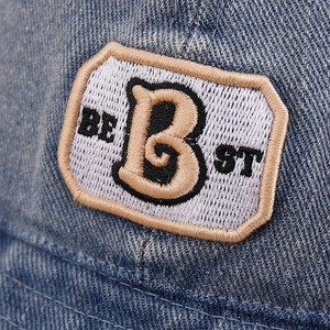 Kids denim bucket hat with embroidered B letter patch and BEST typography detail