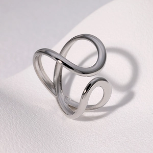Minimalist silver asymmetric open ring with polished stainless steel streamlined design