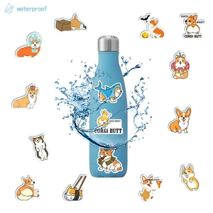 Waterproof Corgi stickers on a blue bottle with water splashes showing durability