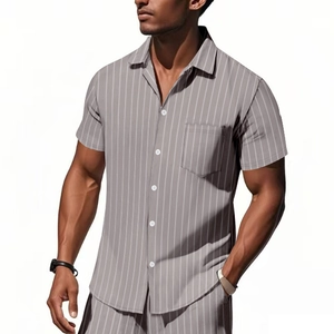 Close-up of grey vertical striped men's short sleeve shirt showing fabric texture