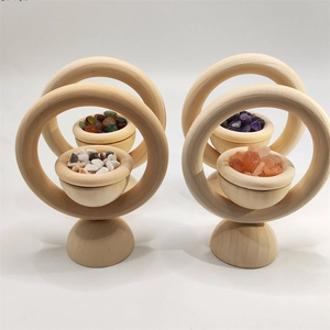 Detailed view of wooden essential oil diffusers with colorful crystal stones inside