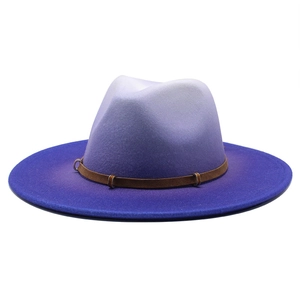 Detail of gradient felt fedora showing blue purple ombre and leather belt with metal rings