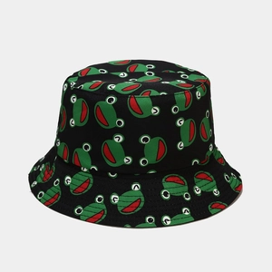 Close-up of black canvas fisherman hat featuring all-over green cartoon frog patterns