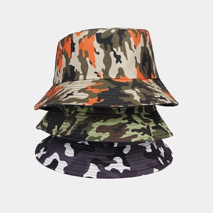 Three assorted camouflage bucket hats in orange, green and grey patterns with wide brims