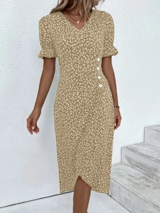 Ginger yellow floral dress with puff sleeves and button detail on the side