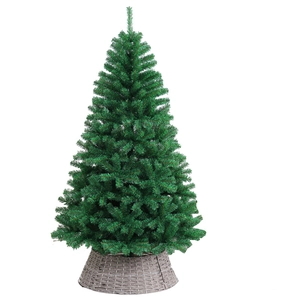Lush green artificial Christmas tree with a decorative grey wicker basket base on white background