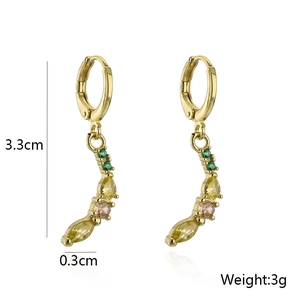 Detailed view of 18K gold crescent earrings with green yellow and pink zircons