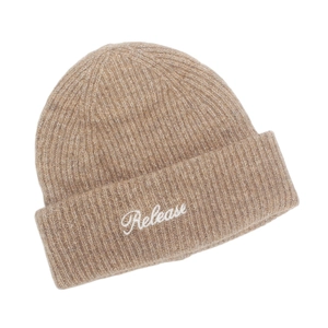 Detailed view of khaki ribbed knit beanie with white 'Release' cursive embroidery
