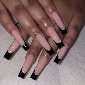 Extra long coffin press-on nails with black French tips and silver glitter outlines