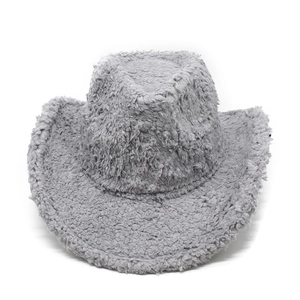 Detailed texture of thick grey plush faux fur on a wide brim western cowboy hat